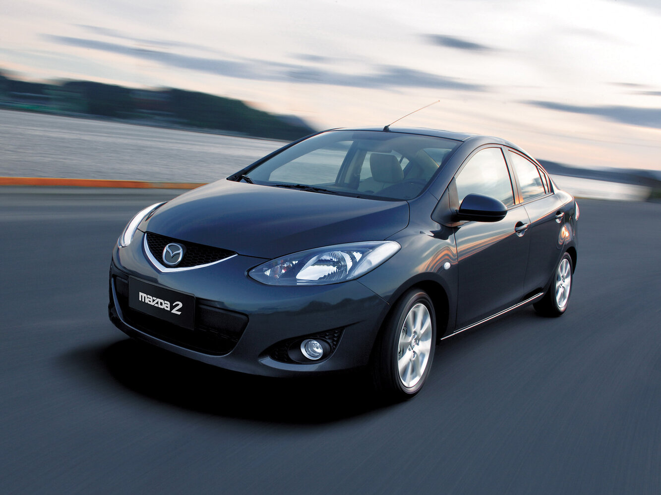 Mazda 2 II (2007-2014) - Седан