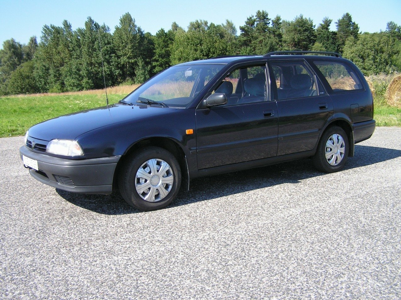 Nissan Primera I (1990-1997) - Универсал 5 дв.