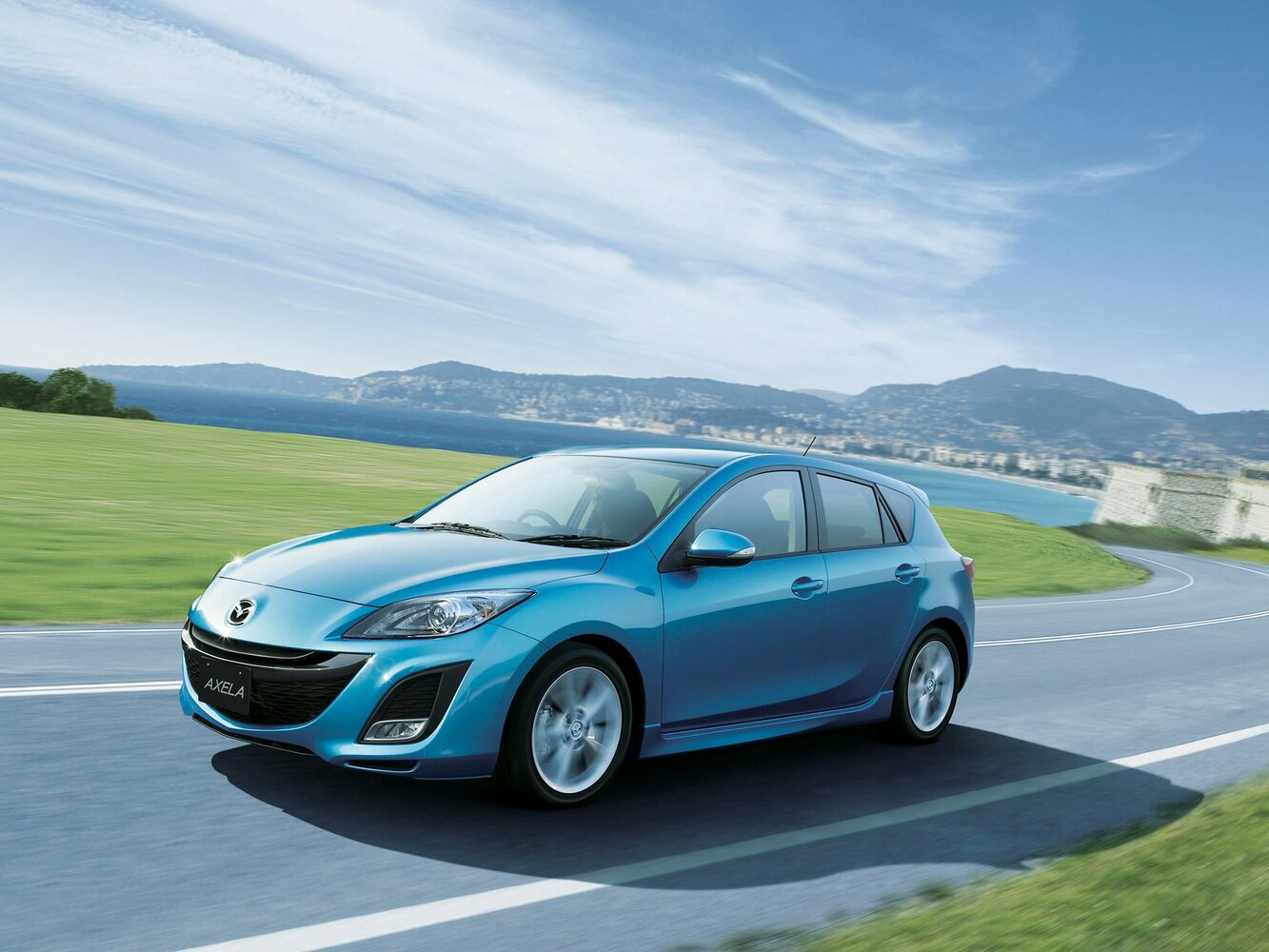 Mazda Axela II (2009-2013) - Хэтчбек 5 дв.