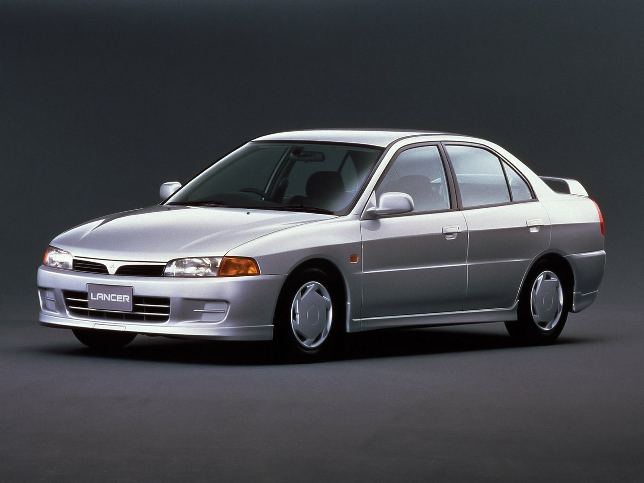 Mitsubishi Lancer VII (1995-2000) - Седан