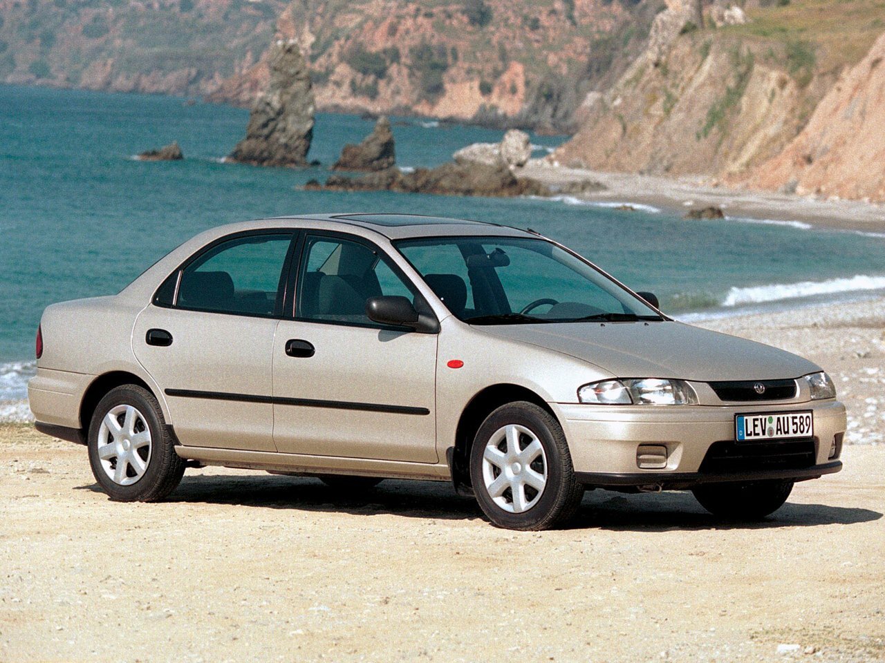 Mazda Familia VII (1994-1999) - Седан